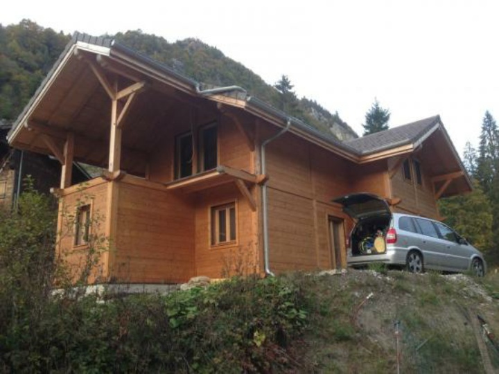 Chalet en bois (madriers) dessinée par DessineNousUneMaison.com en Midi-Pyrénées